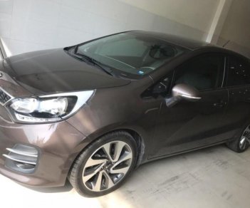 Kia Rio 1.4 AT 2015 - Bán ô tô Kia Rio 1.4 AT 2015, màu nâu, nhập khẩu nguyên chiếc số tự động, giá tốt