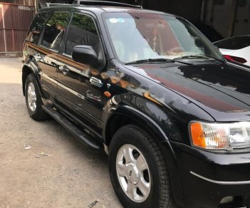 Ford Escape 3.0 V6 2003 - Cần bán Ford Escape 3.0 V6 đời 2003, màu đen