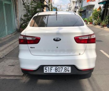 Kia Rio 1.4MT  2016 - Cần bán lại xe Kia Rio 1.4MT sản xuất năm 2016, màu trắng, nhập khẩu, xe gia đình, 415 triệu