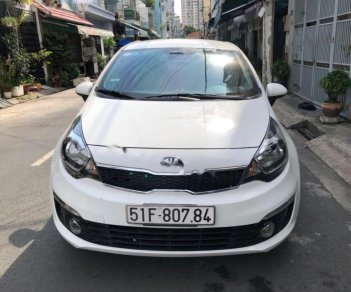 Kia Rio 1.4MT  2016 - Cần bán lại xe Kia Rio 1.4MT sản xuất năm 2016, màu trắng, nhập khẩu, xe gia đình, 415 triệu