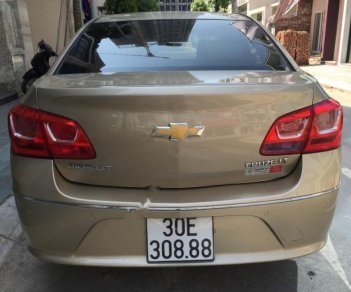 Chevrolet Cruze LT 1.6 MT 2015 - Bán xe Chevrolet Cruze LT 1.6 MT sản xuất năm 2015, màu vàng cát