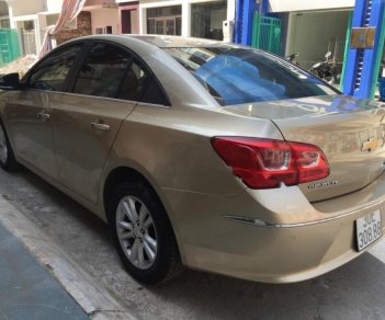 Chevrolet Cruze LT 1.6 MT 2015 - Bán xe Chevrolet Cruze LT 1.6 MT sản xuất năm 2015, màu vàng cát