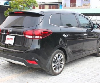 Kia Rondo GAT 2018 - Cần bán lại xe Kia Rondo GAT sản xuất 2018, màu đen