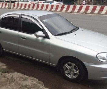 Daewoo Lanos SX 2005 - Cần bán Daewoo Lanos SX năm sản xuất 2005, màu bạc xe gia đình