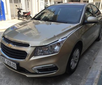 Chevrolet Cruze LT 1.6 MT 2015 - Bán xe Chevrolet Cruze LT 1.6 MT sản xuất năm 2015, màu vàng cát