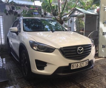 Mazda CX 5 2016 - Cần bán lại xe Mazda CX 5 năm 2016, màu trắng như mới, giá 815tr