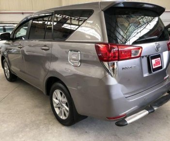 Toyota Innova  E 2016 - Bán Toyota Innova E đời 2016, màu xám số sàn, giá tốt