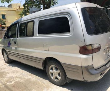 Hyundai Starex 2004 - Cần bán gấp Hyundai Starex 2004, màu bạc