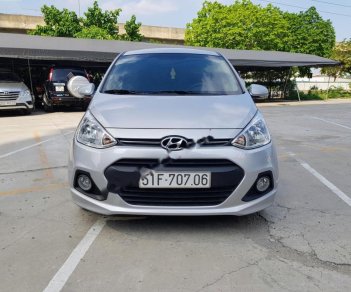 Hyundai Grand i10 1.2 AT 2016 - Bán Hyundai Grand i10 1.2 AT sản xuất năm 2016, màu bạc, xe nhập