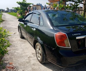 Daewoo Lacetti 2009 - Cần bán xe Daewoo Lacetti 2009, màu đen