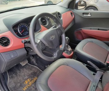 Hyundai Grand i10 1.2 AT 2016 - Bán Hyundai Grand i10 1.2 AT sản xuất năm 2016, màu bạc, xe nhập