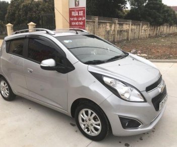 Chevrolet Spark 2016 - Cần bán lại xe Chevrolet Spark sản xuất năm 2016, màu bạc