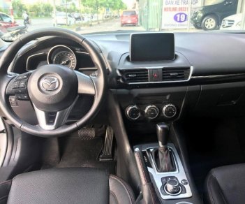 Mazda 3 1.5AT 2015 - Bán xe Mazda 3 1.5AT 2015, màu trắng số tự động, giá 620tr