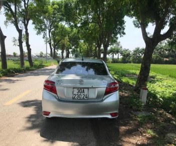 Toyota Vios 1.5 E 2014 - Bán ô tô Toyota Vios 1.5 E năm sản xuất 2014, màu bạc