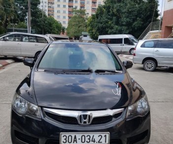 Honda Civic 1.8 MT 2009 - Cần bán Honda Civic 1.8 MT năm sản xuất 2009, màu đen chính chủ