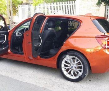 BMW 1 Series 116i  2013 - Bán BMW 1 Series 116i đời 2013, xe nhập, màu cam