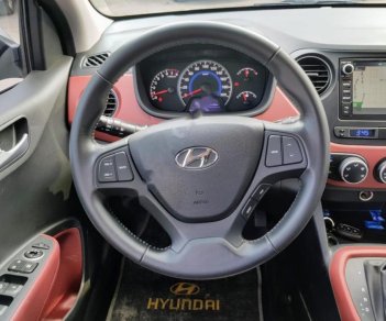 Hyundai Grand i10 1.2 AT 2016 - Bán Hyundai Grand i10 1.2 AT sản xuất năm 2016, màu bạc, xe nhập