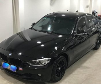 BMW 3 Series 320i 2013 - Cần bán lại xe BMW 3 Series 320i năm sản xuất 2013, màu đen, nhập khẩu nguyên chiếc, giá chỉ 865 triệu