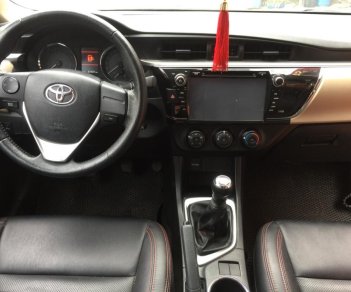 Toyota Corolla altis 1.8MT 2015 - Bán ô tô Toyota Corolla altis 1.8MT đời 2015, màu đen, 610 triệu