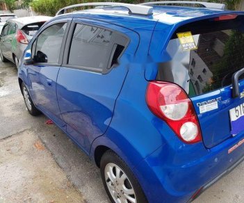 Chevrolet Spark   LTZ  2015 - Bán ô tô Chevrolet Spark LTZ năm 2015 còn mới, màu xanh, giá 295tr