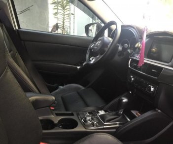Mazda CX 5 2016 - Cần bán lại xe Mazda CX 5 năm 2016, màu trắng như mới, giá 815tr