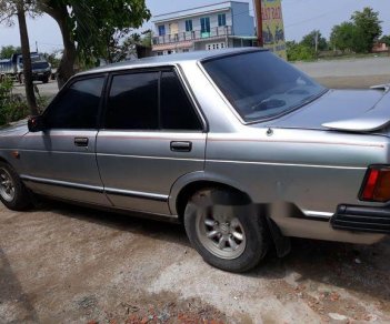 Nissan Bluebird 2005 - Cần bán xe Nissan Bluebird đời 2005, màu bạc