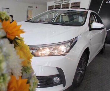 Toyota Corolla 1.8G 2018 - Toyota Nha Trang bán Toyota Corolla 1.8G sản xuất 2018, màu trắng, hỗ trợ ngân hàng