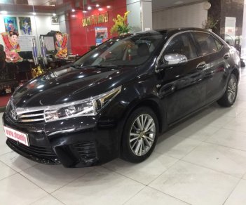 Toyota Corolla altis 1.8MT 2015 - Bán ô tô Toyota Corolla altis 1.8MT đời 2015, màu đen, 610 triệu