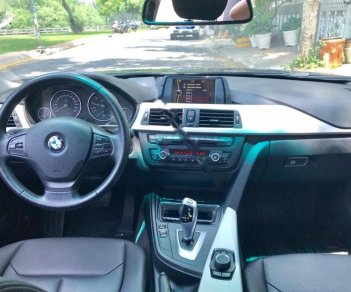 BMW 3 Series 320i 2013 - Cần bán lại xe BMW 3 Series 320i năm sản xuất 2013, màu đen, nhập khẩu nguyên chiếc, giá chỉ 865 triệu