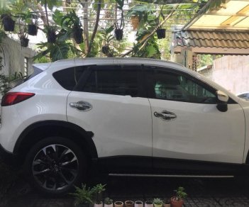 Mazda CX 5 2016 - Cần bán lại xe Mazda CX 5 năm 2016, màu trắng như mới, giá 815tr