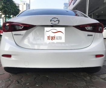 Mazda 3 1.5AT 2015 - Bán xe Mazda 3 1.5AT 2015, màu trắng số tự động, giá 620tr