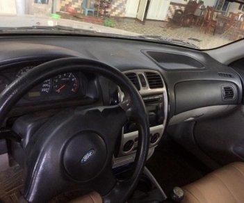 Ford Laser 2005 - Cần bán xe Ford Laser đời 2005, màu bạc xe gia đình