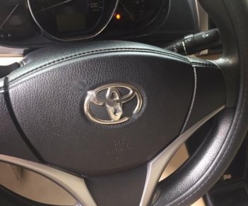 Toyota Vios 1.5E 2014 - Cần bán gấp Toyota Vios 1.5E năm sản xuất 2014, màu đen chính chủ