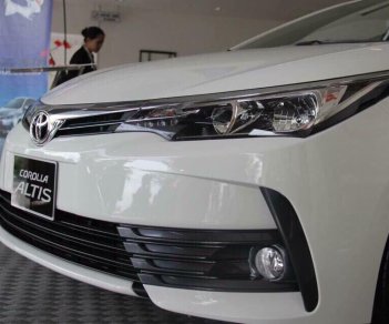 Toyota Corolla 1.8G 2018 - Toyota Nha Trang bán Toyota Corolla 1.8G sản xuất 2018, màu trắng, hỗ trợ ngân hàng