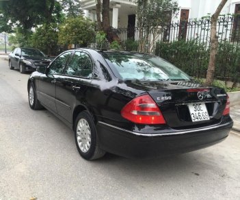 Mercedes-Benz E class E200 MT 2005 - Bán Mercedes E200 MT đời 2005, màu đen, nhập khẩu  