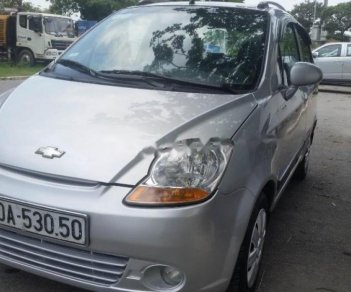 Chevrolet Spark MT   2009 - Gia đình bán lại xe Chevrolet Spark MT 2009, màu bạc 