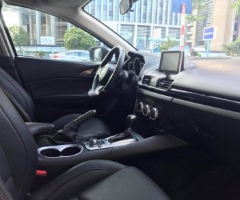 Mazda 3 1.5AT 2015 - Bán xe Mazda 3 1.5AT 2015, màu trắng số tự động, giá 620tr