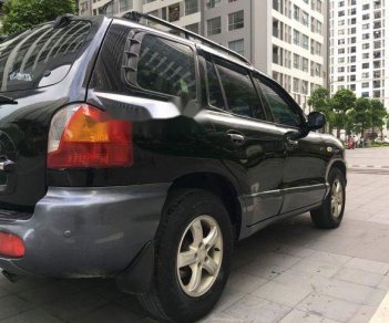 Hyundai Santa Fe  Gold AT  2008 - Cần bán Hyundai Santa Fe Gold AT đời 2008, màu đen chính chủ