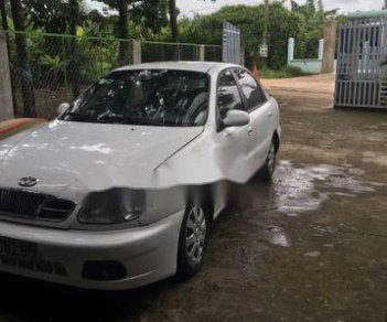 Daewoo Lanos 2002 - Cần bán xe Daewoo Lanos sản xuất 2002, màu trắng