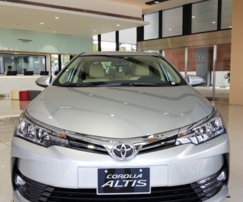 Toyota Corolla altis 1.8G 2018 - Bán ô tô Toyota Corolla Altis 1.8G sản xuất năm 2018, màu bạc, giá cực tốt. LH ngay nhận KM hấp dẫn tháng 5