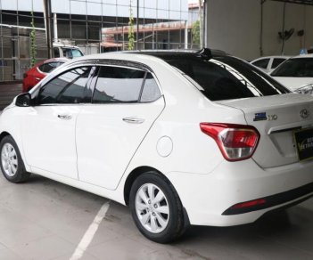 Hyundai Grand i10 1.2MT 2015 - Bán Hyundai Grand i10 1.2MT năm 2015, màu trắng, xe nhập