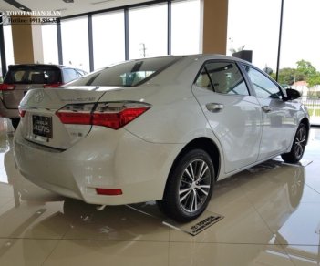 Toyota Corolla altis 1.8G 2018 - Bán ô tô Toyota Corolla Altis 1.8G sản xuất năm 2018, màu bạc, giá cực tốt. LH ngay nhận KM hấp dẫn tháng 5