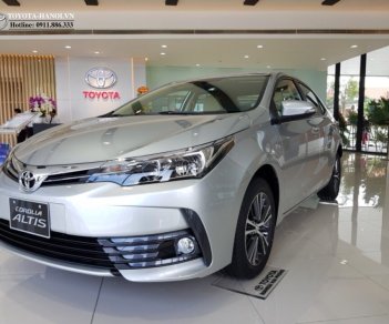 Toyota Corolla altis 1.8G 2018 - Bán ô tô Toyota Corolla Altis 1.8G sản xuất năm 2018, màu bạc, giá cực tốt. LH ngay nhận KM hấp dẫn tháng 5