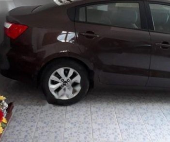 Kia Rio 1.4 AT 2015 - Cần bán gấp Kia Rio 1.4 AT sản xuất năm 2015, màu nâu, nhập khẩu