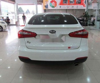 Kia K3 1.6MT  2015 - Bán ô tô Kia K3 1.6MT sản xuất năm 2015, màu trắng