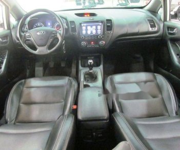 Kia K3 1.6MT  2015 - Bán ô tô Kia K3 1.6MT sản xuất năm 2015, màu trắng