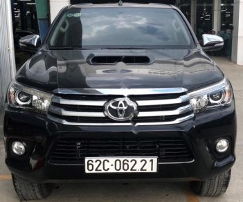 Toyota Hilux 3.0G 4x4 AT 2016 - Bán ô tô Toyota Hilux XLS AT sản xuất năm 2016, màu đen