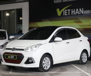 Hyundai Grand i10 1.2MT 2015 - Bán Hyundai Grand i10 1.2MT năm 2015, màu trắng, xe nhập