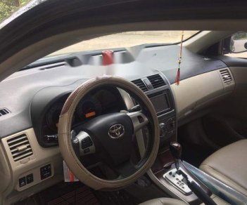Toyota Corolla altis 2.0V 2014 - Bán xe Toyota Corolla altis 2.0V năm 2014, màu đen chính chủ, giá tốt