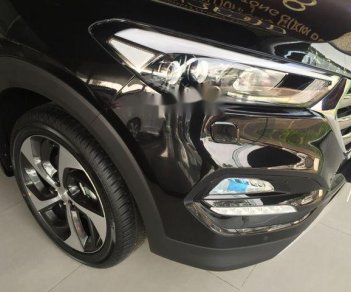 Hyundai Tucson 1.6 AT Turbo  2018 - Bán xe Hyundai Tucson 1.6 AT Turbo đời 2018, màu đen, 900 triệu